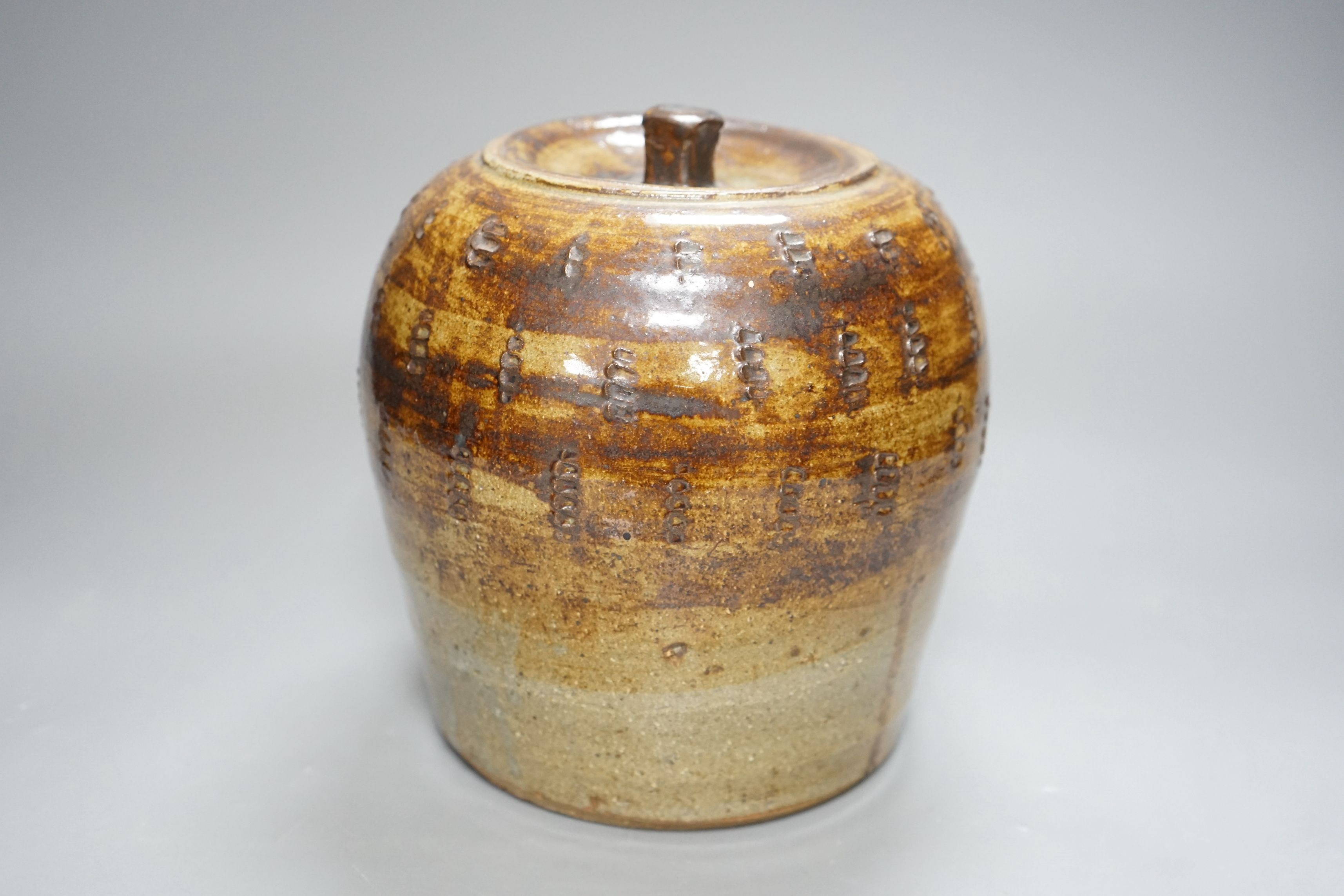 William Marshall (1923–2007), a brown glazed stoneware jar and cover, impressed mark, 22cm tall